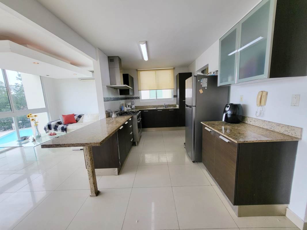 Dining area with modern decor and recessed lighting at PH Pine Hill Clayton Panama City