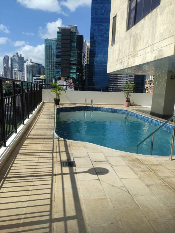 Kitchen with granite countertops and wood cabinets Punta Pacifica apartment Panama City