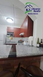 Bedroom with two twin beds, ceiling fan and closet in PH Boquete Gardens Panama