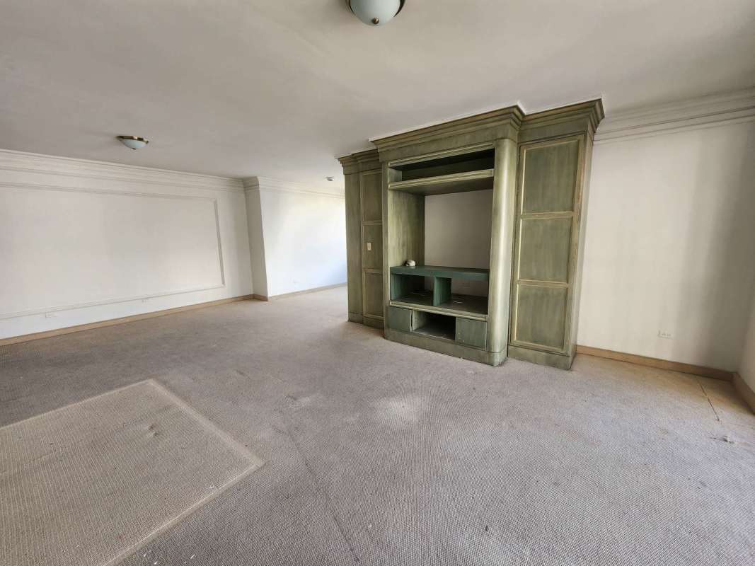 Large kitchen area with marble flooring, spacious countertop, natural light in PH Paitilla Penthouse Panama