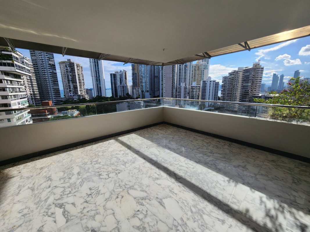 Bright family or entertainment room with large windows in PH Paitilla Penthouse Panama