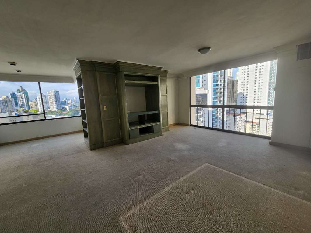 Formal dining space with marble floors and open layout in PH Paitilla Penthouse Panama City