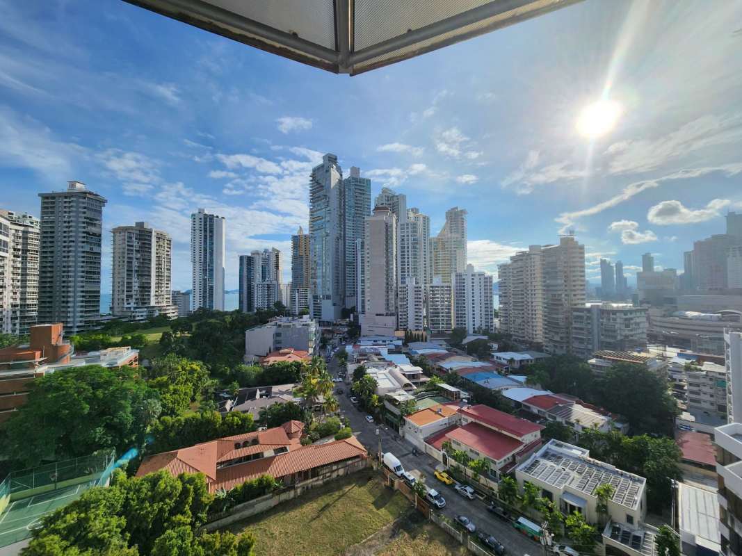 Panoramic city skyline and ocean views from penthouse terrace in PH Paitilla Panama City