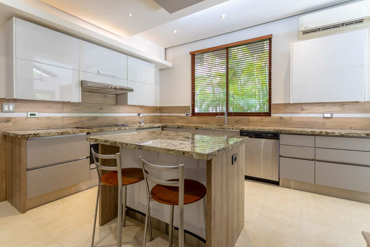 Spacious living room with marble floors, garden view windows Camino de Cruces Panama luxury house