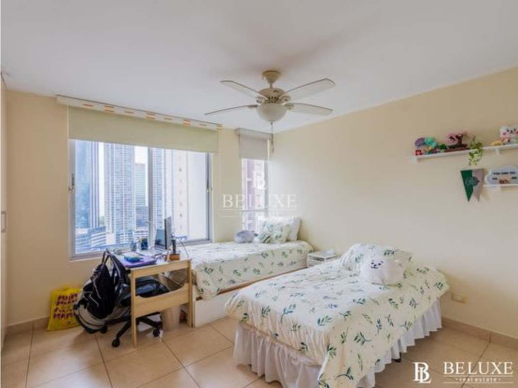Modern bathroom with granite countertop vanity and glass shower in Costa View Panama