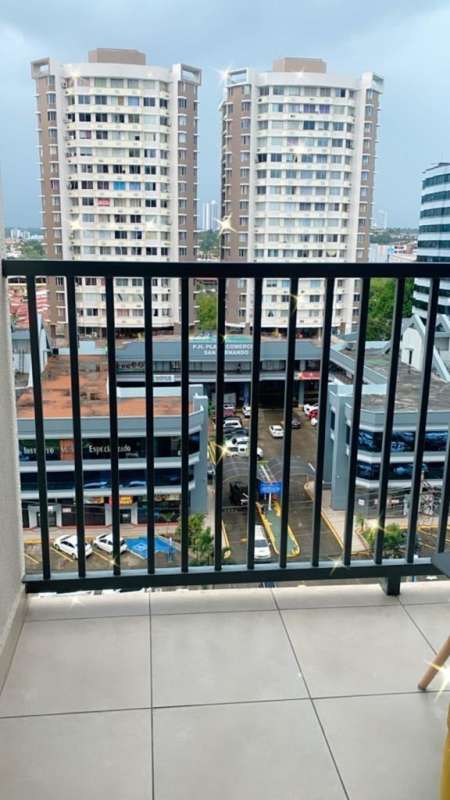Balcony overlooking urban skyscrapers commercial buildings PH Carrasquilla Towers Panama