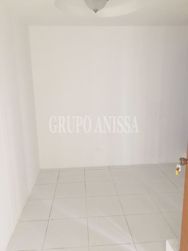 Minimalist small empty white room with ceramic tiles inside PH BAC Tower office space