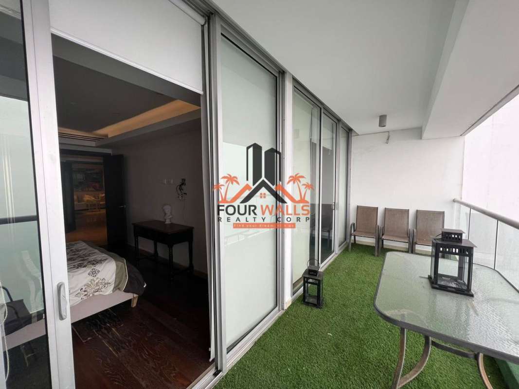 Interior marble staircase in double height luxury loft PH Rivage Panama City