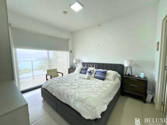 Master suite with panoramic ocean view window in PH Solaria Punta Caelo San Carlos Panama