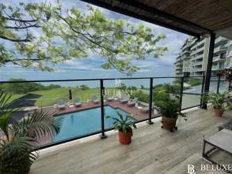 Open plan kitchen with ocean view in beachfront condo Punta Caelo Panama