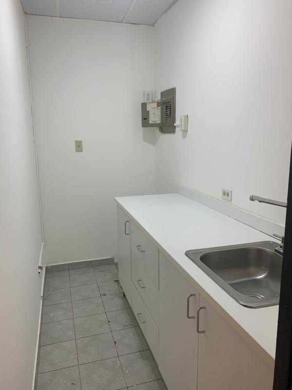 Simple white tiled bathroom pedestal sink mirror in PH Omega Obarrio Panama