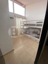 Modern bedroom with large window, AC unit Paradise Point Coronado Panama