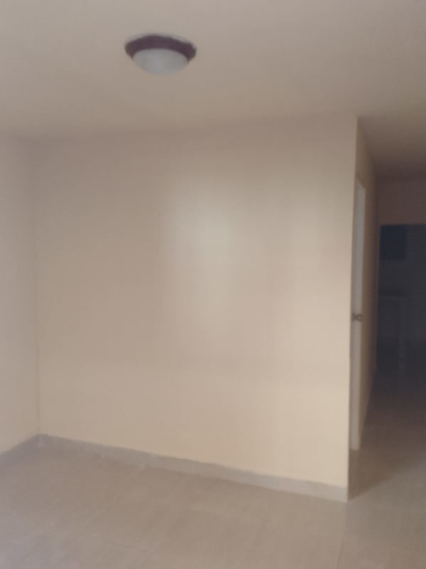 Minimalist kitchen with concrete sink counter and wall cabinet Río Abajo Panama