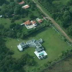 Drone view luxury villa large gardens pool private lot Santa Clara Panama