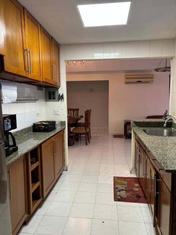 Bedroom with ceiling fan, closet and tile floors in Panama house Brisas del Golf