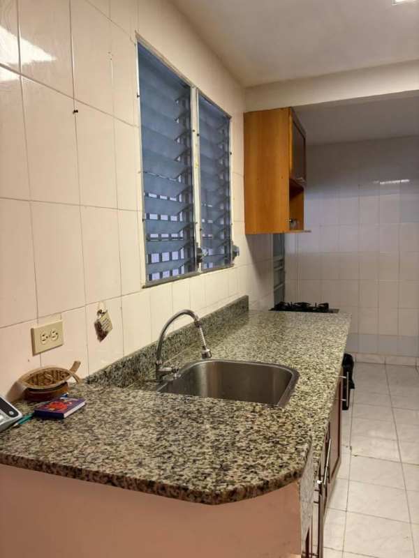 Bedroom with tile floors, window and neutral decor house Panama City