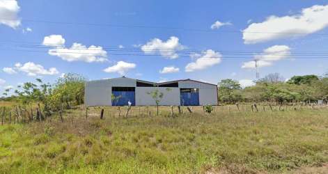 Front photo of metal insulated warehouses on large rural fenced lot in El Chirú Antón Panama