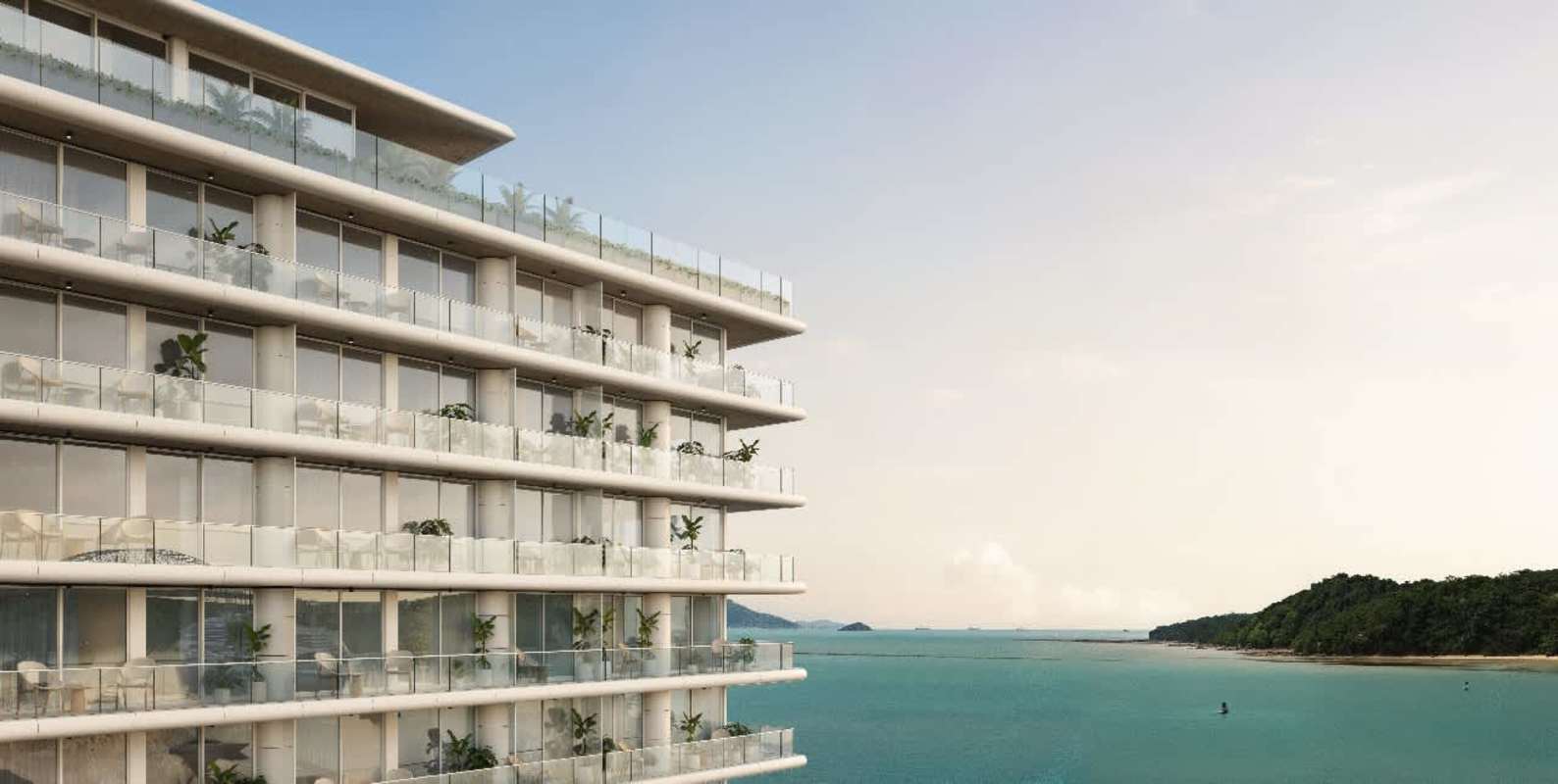 Modern waterfront building with glass balconies and island views PH Nautilus Panama