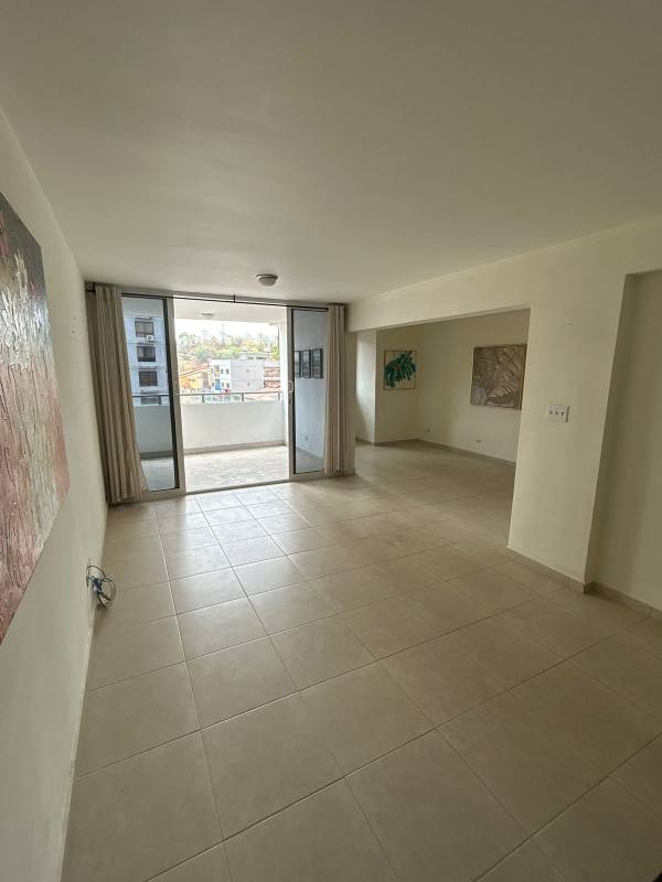Modern bathroom glass enclosed shower, vanity in Villa de las Fuentes apartment Panama