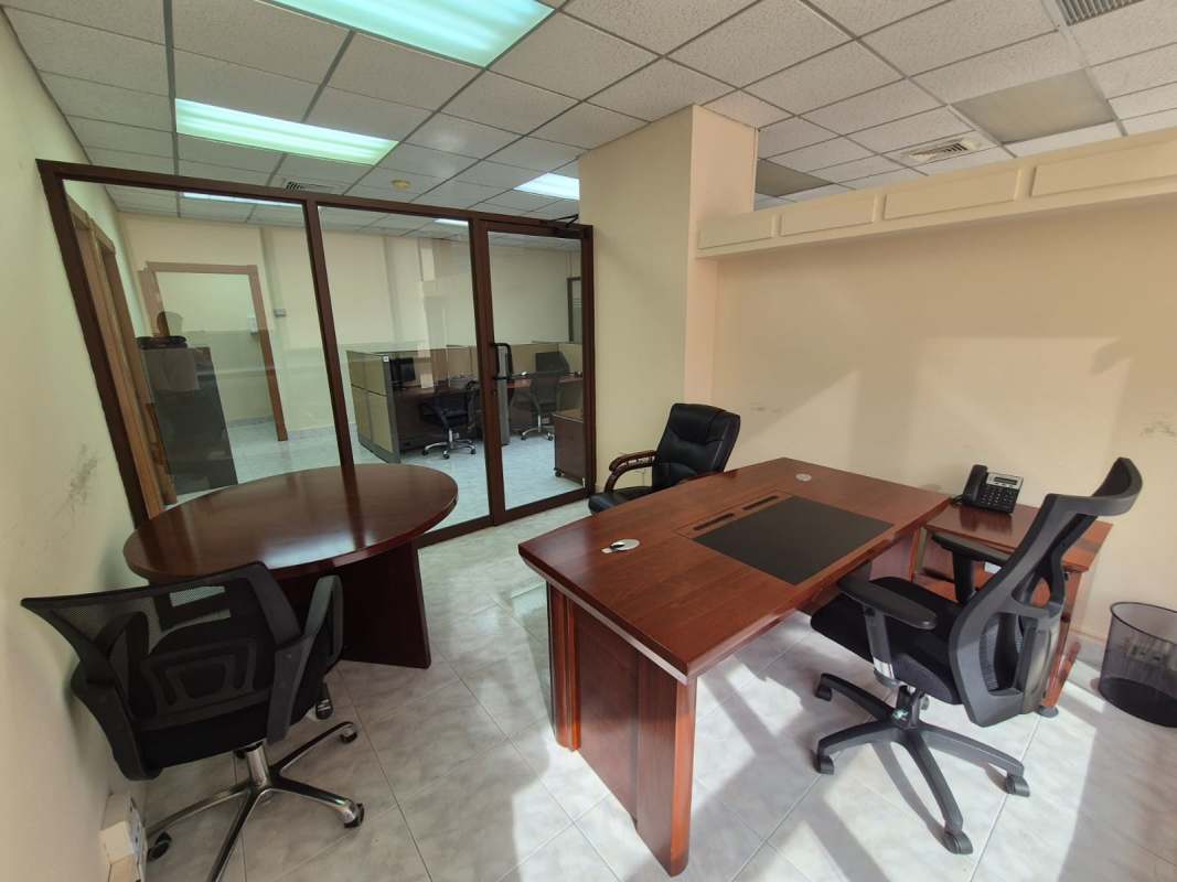 Private furnished office executive desk window Plaza Banco General banking district Panama City