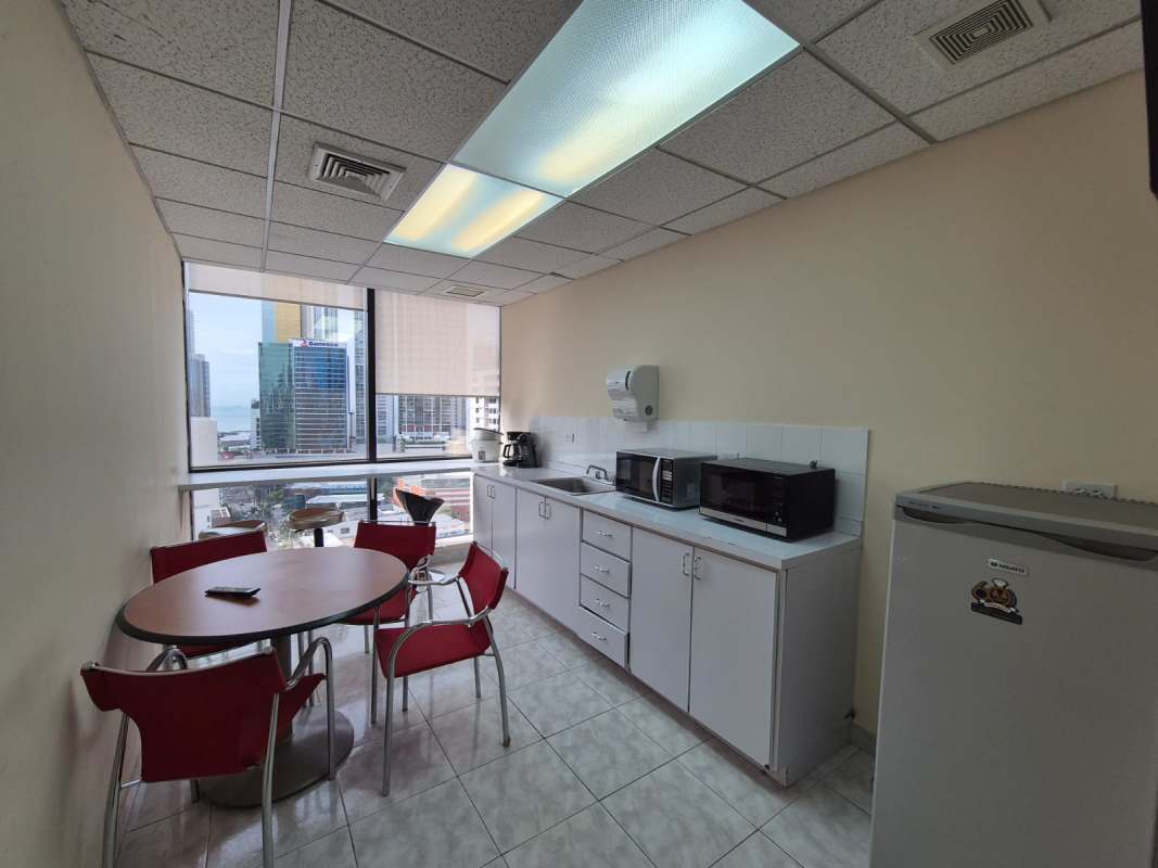 Conference boardroom with TV executive chairs panoramic windows Plaza Banco General Tower Panama