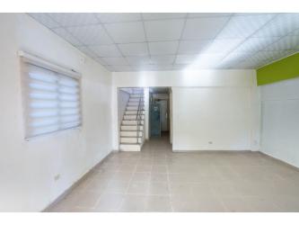 Bright empty interior living room with ceramic tile floor and white walls rural house Panama