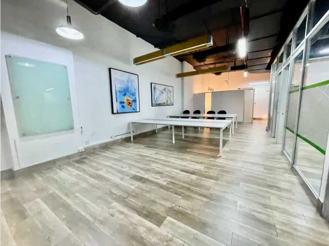 Compact kitchenette with white cabinets subway tile backsplash in Plaza 58 Obarrio Panama