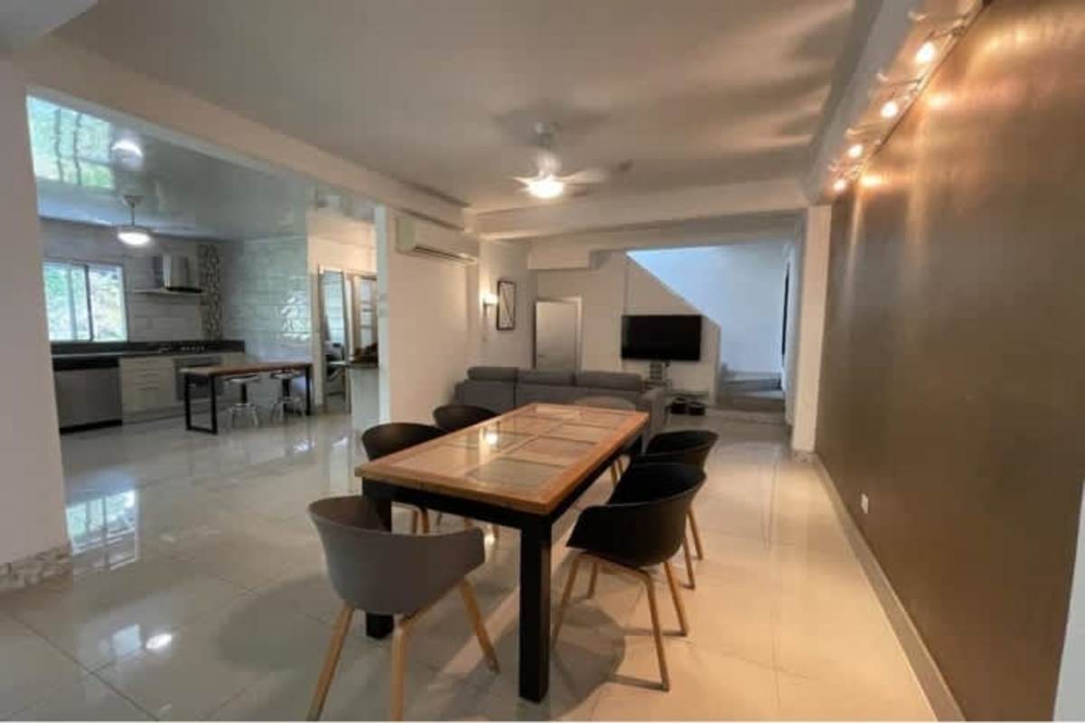 Bright living dining space with modern decor large windows in Clayton house Panama