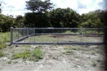 Fenced empty lot ready to build close to Pacific beaches and Coronado commercial hub.