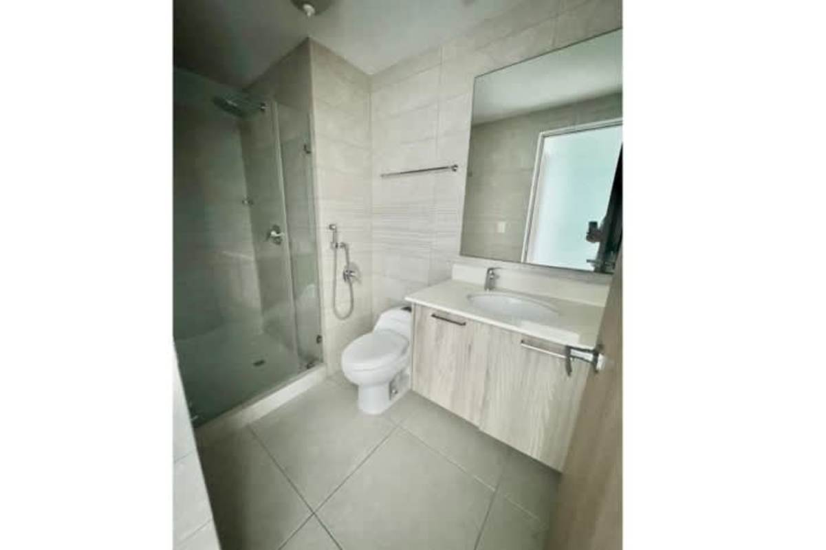 Bathroom with vanity and glass shower enclosure in luxury house Altos del Golf Panama