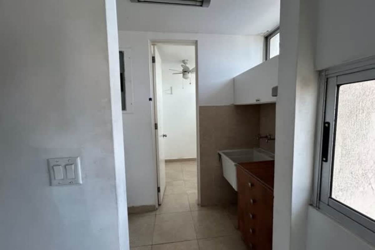 Empty master bedroom with large windows ocean view PH Quartz San Francisco Panama