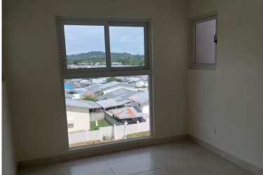 Spacious master bedroom with tile flooring at Playa Dorada Residences Ocean condo Panama Oeste