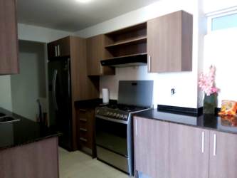 Double sink vanity and glass shower Playa Blanca condo Panama