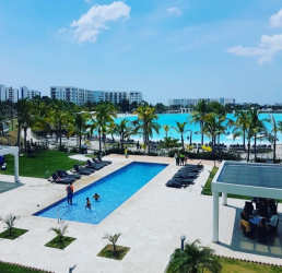 Beachfront pools and lounge chairs at PH Waterways Playa Blanca Rio Hato Panama