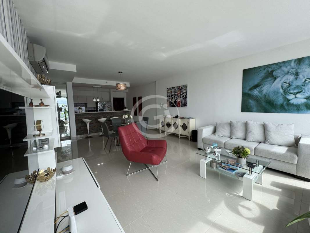 Modern open kitchen with granite countertops, breakfast bar, pendant lights Costa del Este Panama