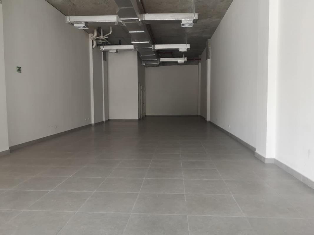 Unfurnished commercial office space with glazed entry and tiled flooring in Sunset Strip Plaza Panama