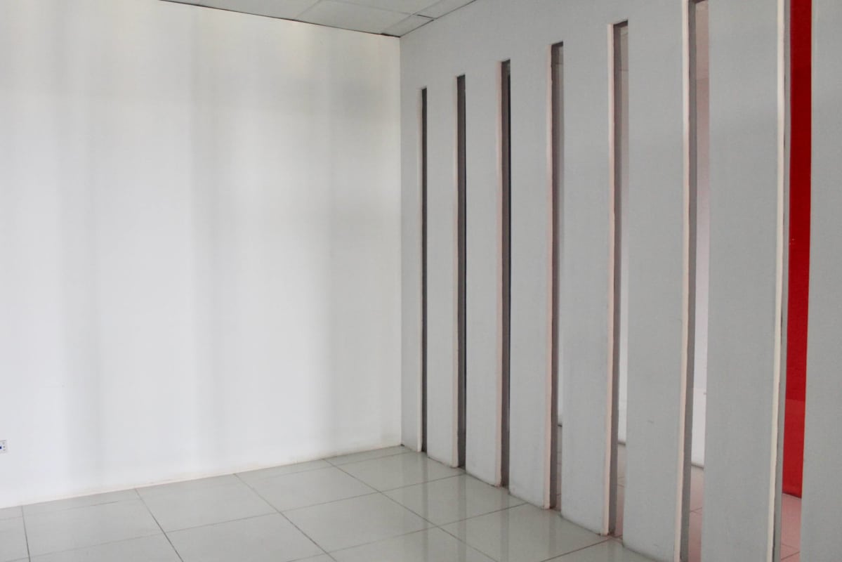 Empty retail or office space with partition wall in Display Plaza Panama City