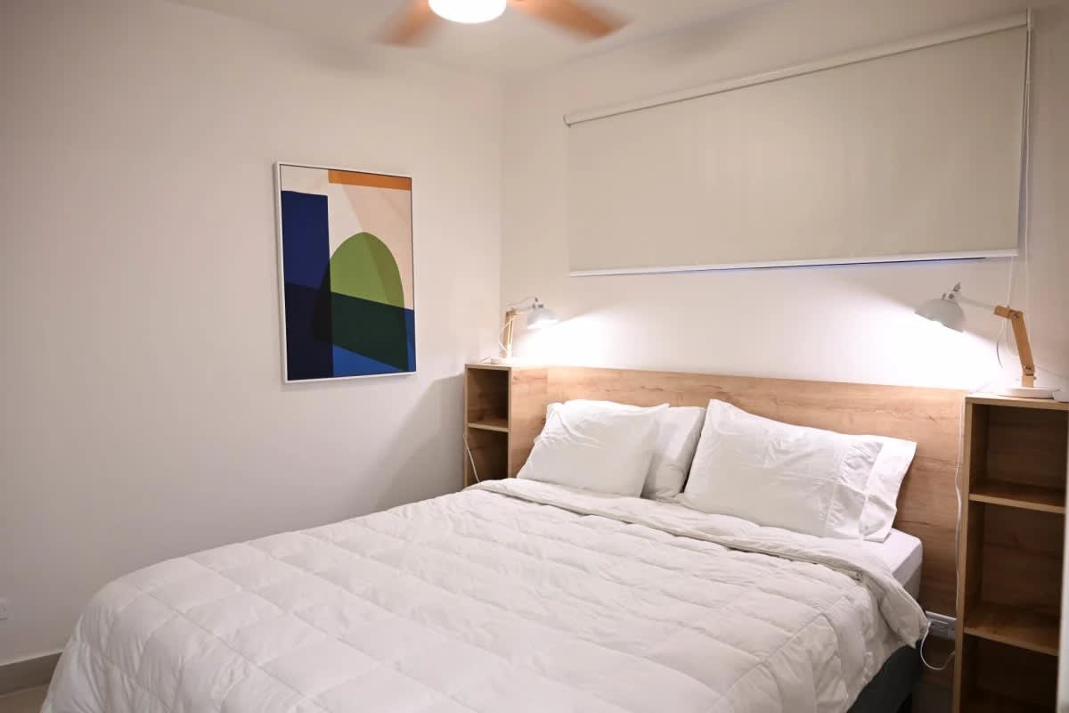 Minimalist bedroom with built-in closet, queen bed, AC, large window Casco View Santa Ana Panama