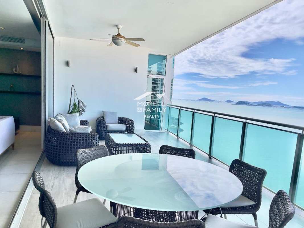 Spacious modern kitchen with granite island, wood cabinetry, stainless appliances PH Aqua Mare Panama