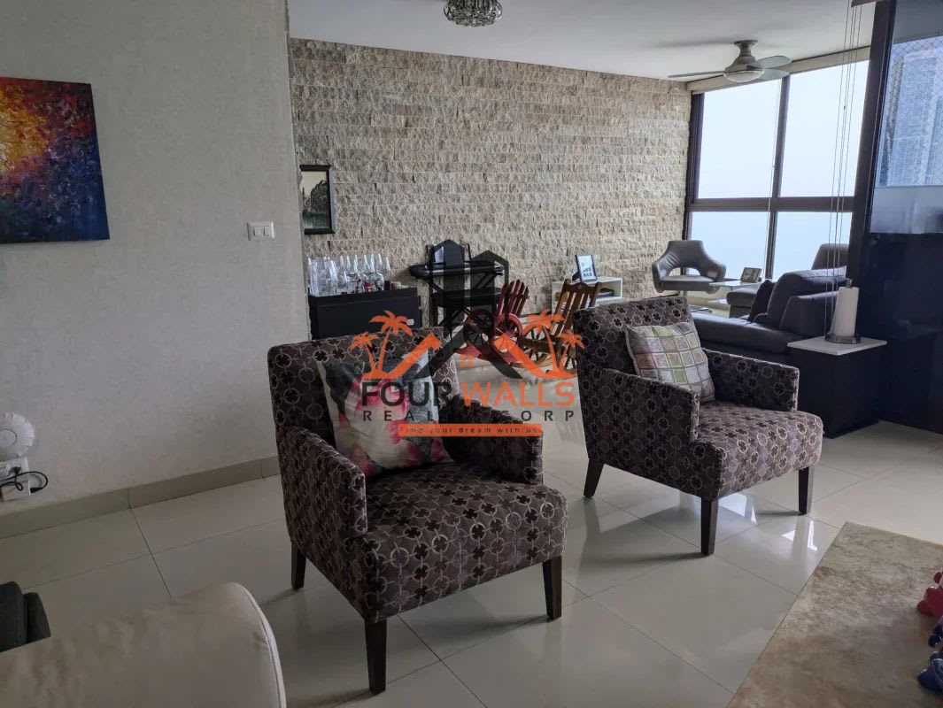 Modern kitchen with granite countertops and full appliances in PH San Francisco Bay Tower 400