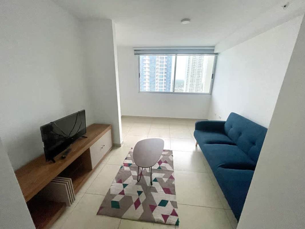 Minimalist living room with blue sofa, large window city view PH Santa Maria Costa del Este