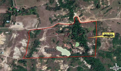 Aerial property view with boundary outlined water features dirt roads Penonomé