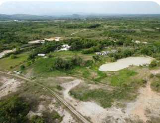 Aerial rural property with pond, open fields dirt roads Miraflores Penonomé Coclé