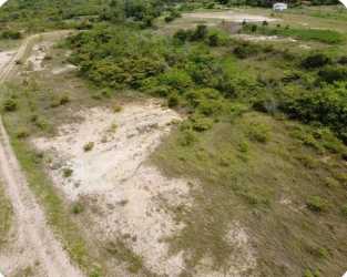 Aerial view of open vacant land with vegetation and dirt paths Miraflores Penonomé