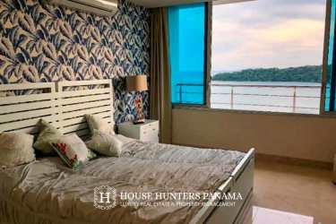 Luxury bathroom featuring corner jacuzzi tub, glass shower, and double sinks at PH Casa Bonita Panama
