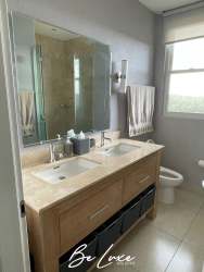 Sunny bedroom with built-in closets and ocean view at PH Laguna Buenaventura Panama