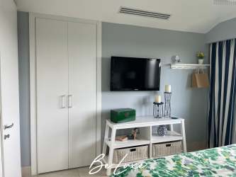 Modern bathroom with glass shower and vanity at PH Laguna Buenaventura Panama