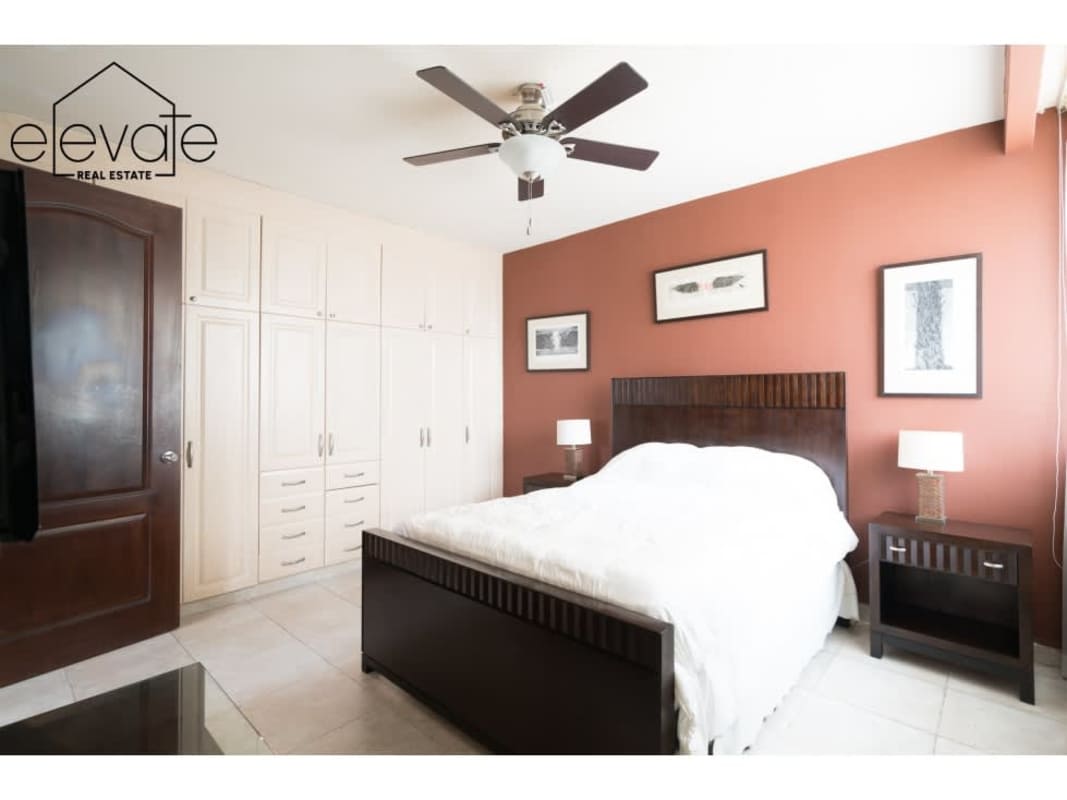 Spacious master bedroom with panoramic windows and closet PH Mystic Point Panama