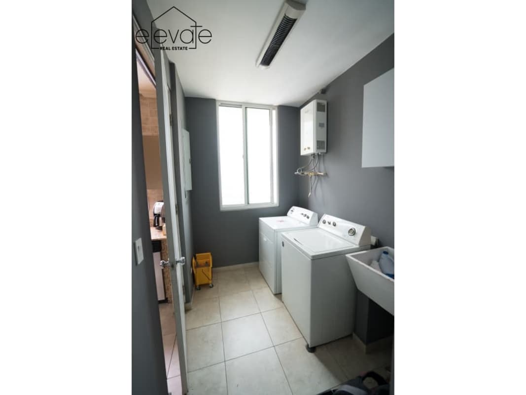 Kitchen with granite countertops, gas stove, appliances in PH Mystic Point Punta Pacífica Panama City