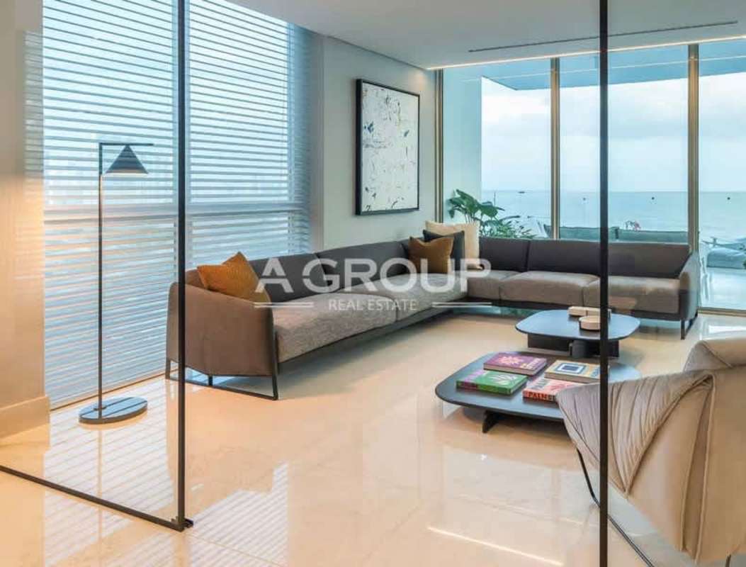 Modern bedroom with city views from large windows in Pacific Point Tower 400 Punta Pacifica